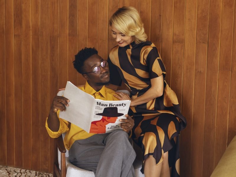 front-view-couple-reading-together